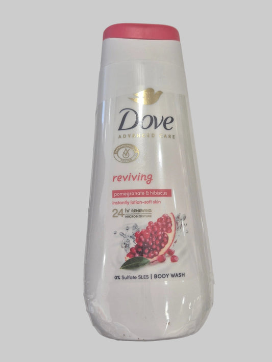 Dove body wash bottle with pomegranate design on a gray background