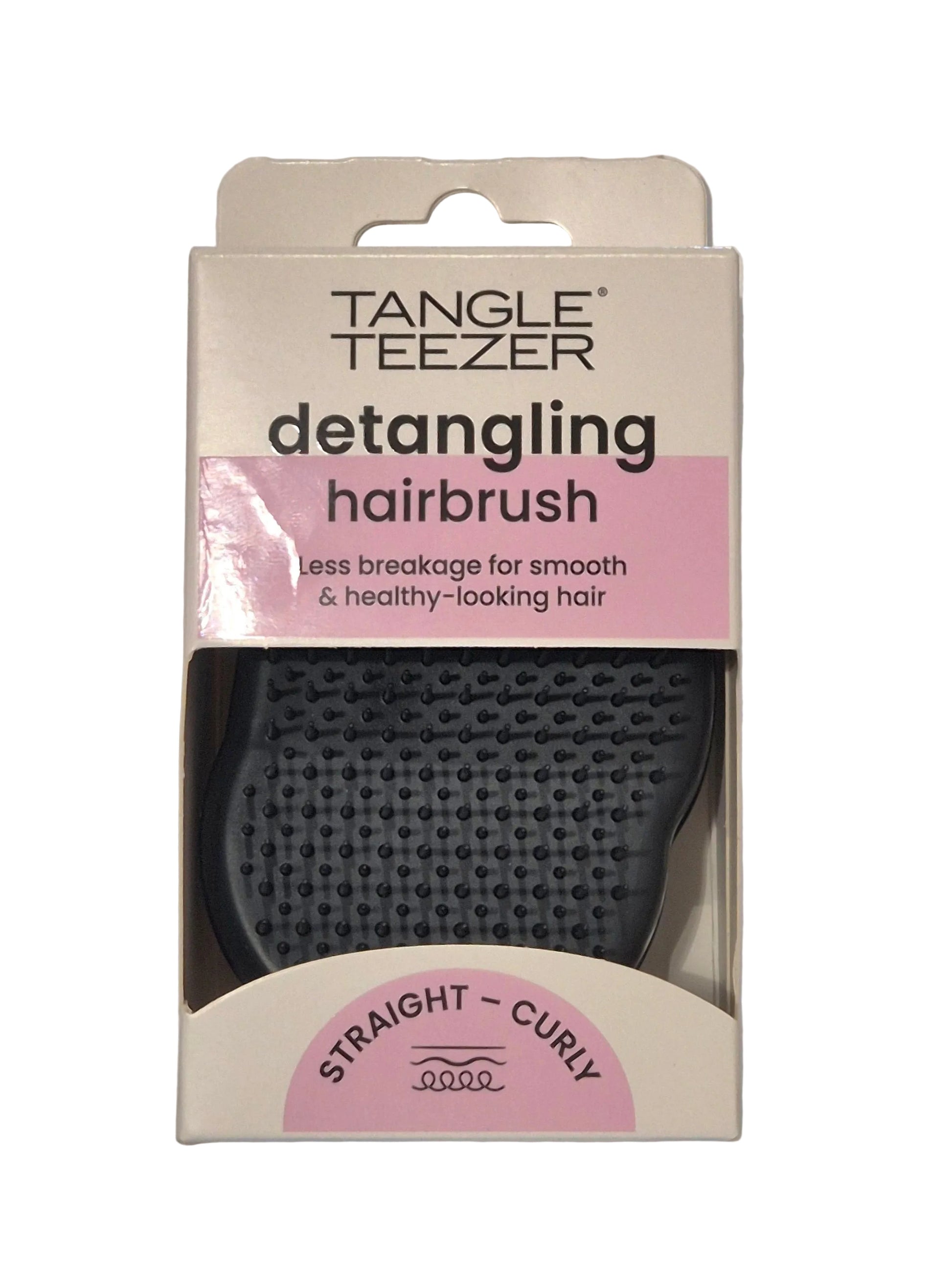 Tangle Teezer detangling hairbrush packaging on a gray background