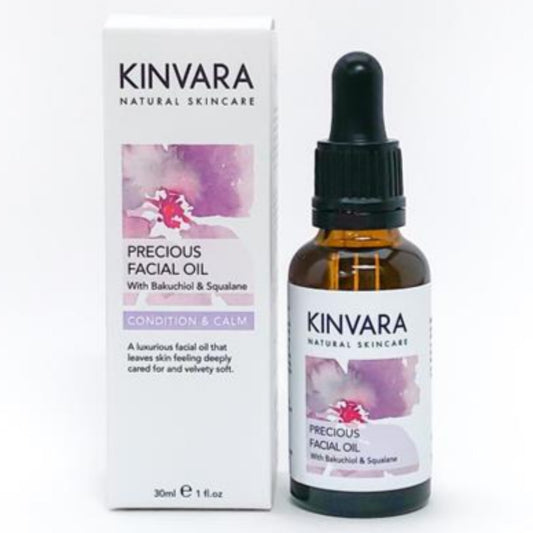 Kinvara Natural Skincare precious facial oil with bakuchiol and squalane. Condition and Calm. A luxurious facial oil that leaves skin feeling deeply cared for and velvety soft. 30ml. Dark Glass Bottle with dropper.