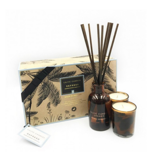 Celtic Candles Gift Set, Box includes Diffuser in Brown bottle, dark brown reed sticks and 2 votive candles in brown glass. Pomelo and Grapefruit Scent